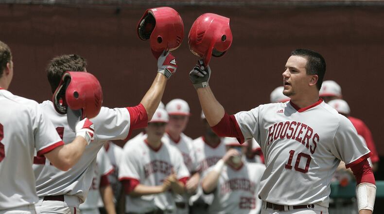 Indiana’s Kyle Schwarber, a graduate of Middletown High School, celebrates with teammates after hitting a two-run home run in the fourth inning against Florida State in an NCAA Super Regional college baseball game on Saturday, June 8, in Tallahassee, Fla. Indiana won the game 10-9.