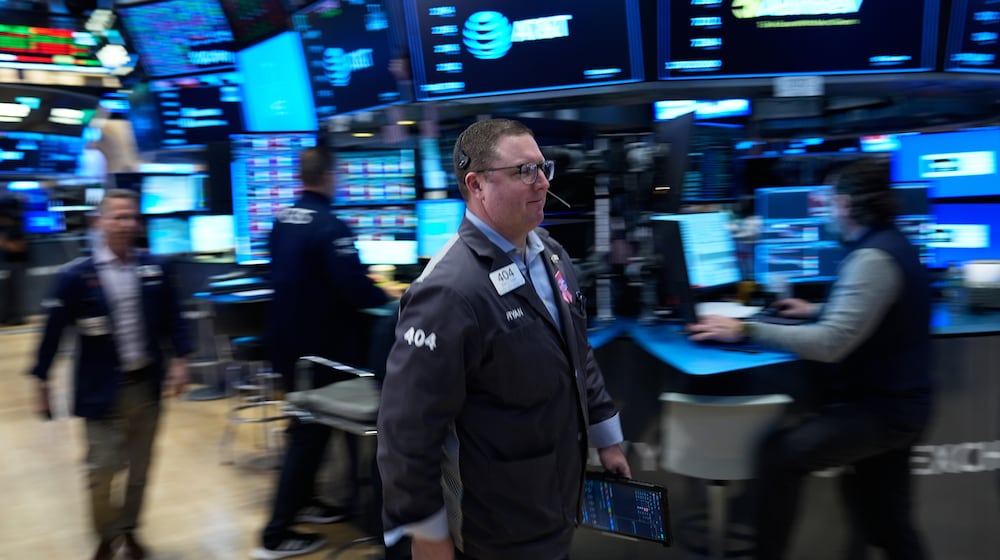 Ryan Falvey works on the floor at the New York Stock Exchange in New York, Tuesday, March 10, 2026. (AP Photo/Seth Wenig)