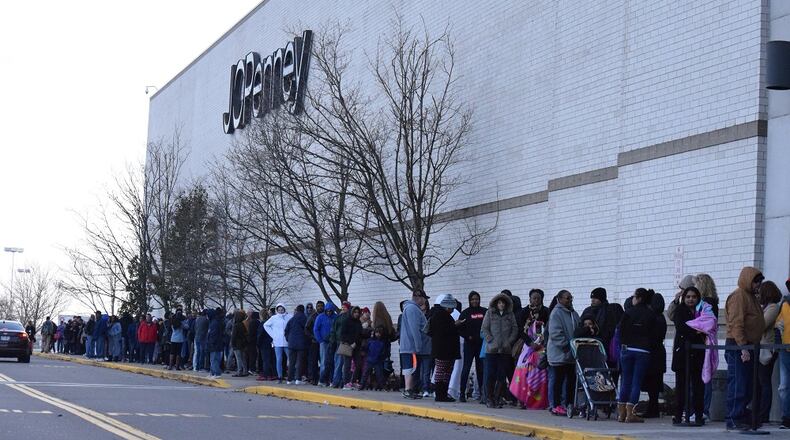 Shoppers line up for deals at JCPenney on Thanksgiving. STAFF PHOTO / HOLLY SHIVELY