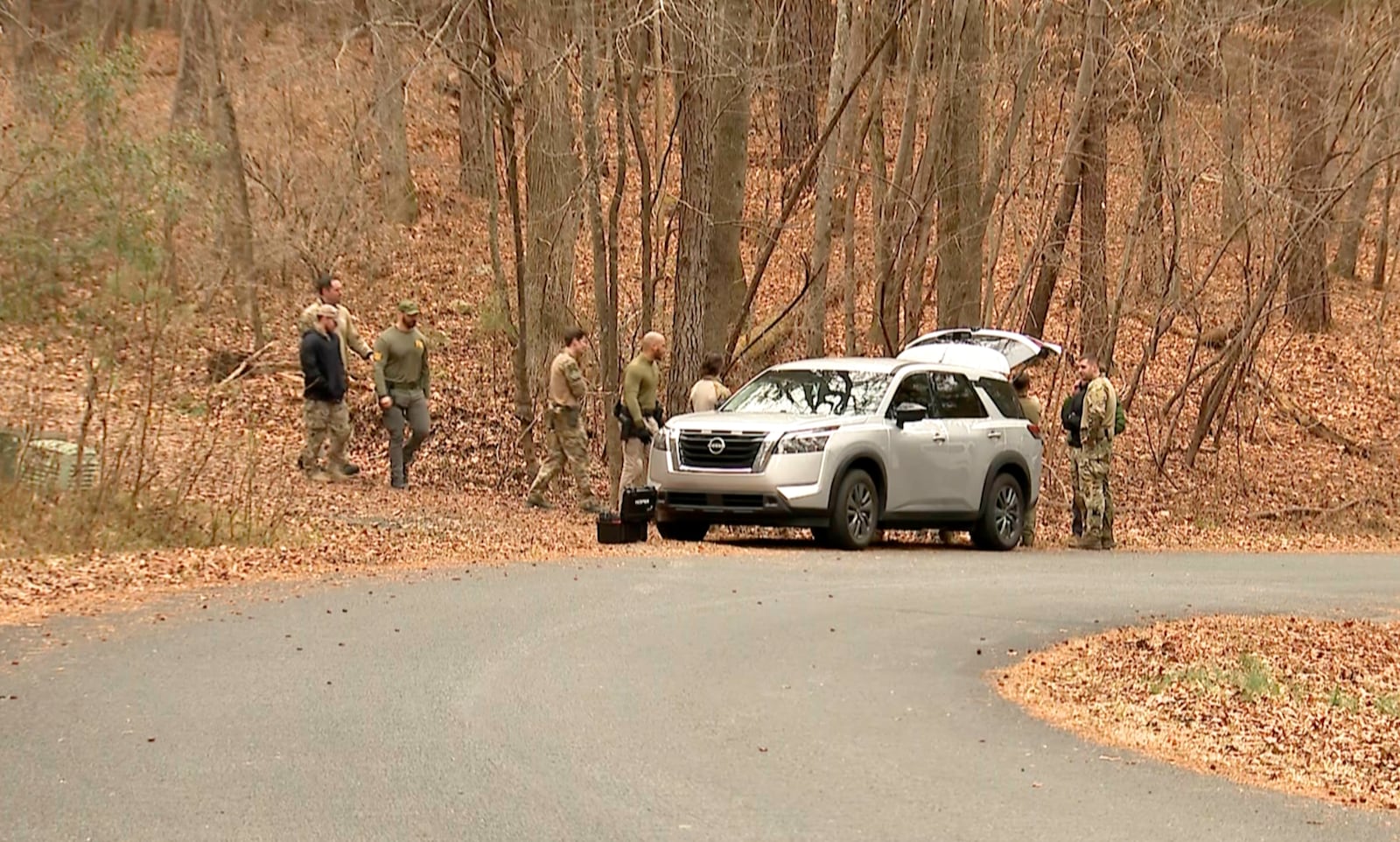 FILE - FBI agents search a neighborhood in Chapel Hill, North Carolina on Wednesday, Feb. 5, 2025, where Teresa Youngblut and Felix Bauckholt, who were involved in the shooting death of a U.S. Border Patrol agent in Vermont, had been renting homes in the neighborhood, their landlord told The Associated Press. (WRAL-TV via AP, file)