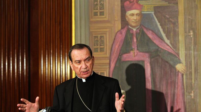 Asked whether Catholic church policy on gay people is bigoted, the office of Cincinnati Archbishop Dennis Schnurr said the Archdiocese “has no interest in compromising the moral teaching of the Catholic Church, which leads to freedom from sin and the fullness of life in God.” NICK DAGGY / STAFF