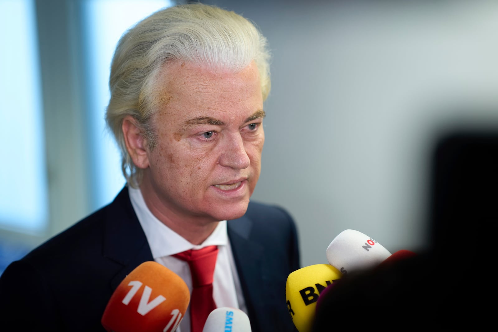 Far-right lawmaker Geert Wilders talks to the media after pulling his party out of the four-party Dutch coalition in The Hague, Netherlands, Tuesday, June 3, 2025. (AP Photo/Peter Dejong)