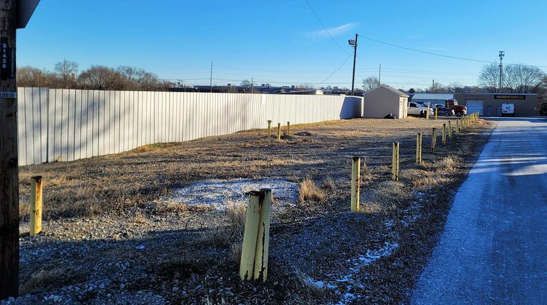 Hamilton has been named a responsible party in the remediation of the former Pleasant Avenue landfill off Benninghofen Avenue. The once-owned city property closed in 1970, and as the city's remediation plan, Hamilton will install an active methane gas collection system, which requires an easement in front of the property of House Towing. NICK GRAHAM/STAFF