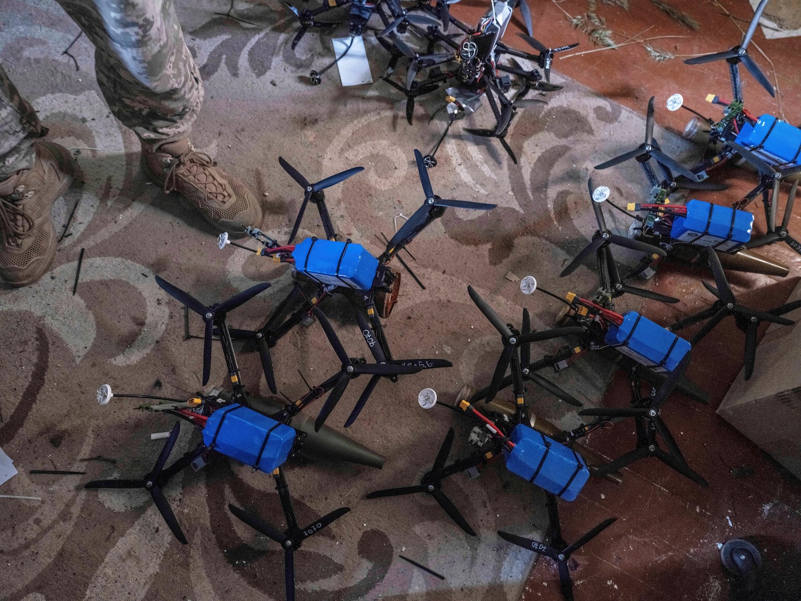 FILE - In this photo provided by Ukraine's 93rd Kholodnyi Yar Separate Mechanized Brigade, drones are prepared to be fired towards Russian positions at a shelter in Kostyantynivka, Donetsk region, Ukraine, on May 23, 2025. (Iryna Rybakova/Ukraine's 93rd Mechanized Brigade via AP, File)