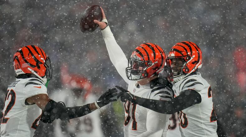 Cincinnati Bengals defensive end Trey Hendrickson (91) reacts after recovering a fumble by the Buffalo Bills during the fourth quarter of an NFL division round football game, Sunday, Jan. 22, 2023, in Orchard Park, N.Y. (AP Photo/Seth Wenig)
