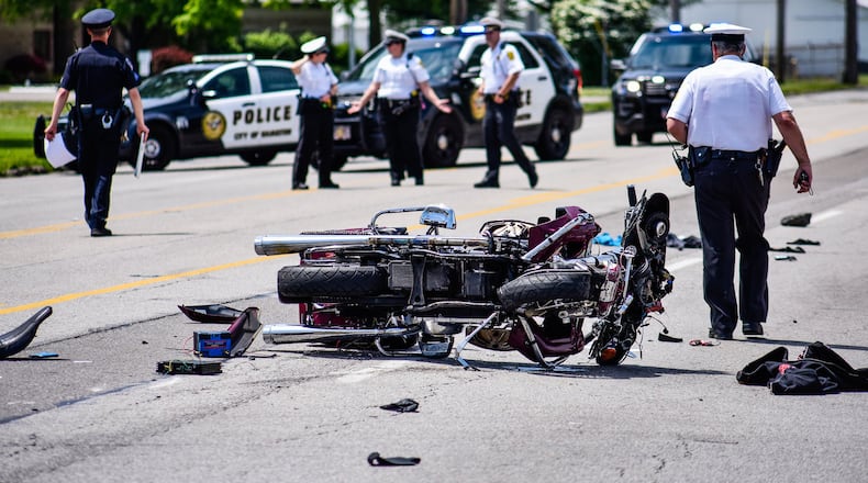 A medical helicopter was called for a crash between a car and a motorcycle Tuesday afternoon, May 7 at Fairgrove Avenue (Ohio 4) and Campbell Drive in Hamilton. Hamilton police and the Butler County Serious Traffic Accident Reconstruction Team was on the scene investigating and used of a drone for aerial images. NICK GRAHAM/STAFF