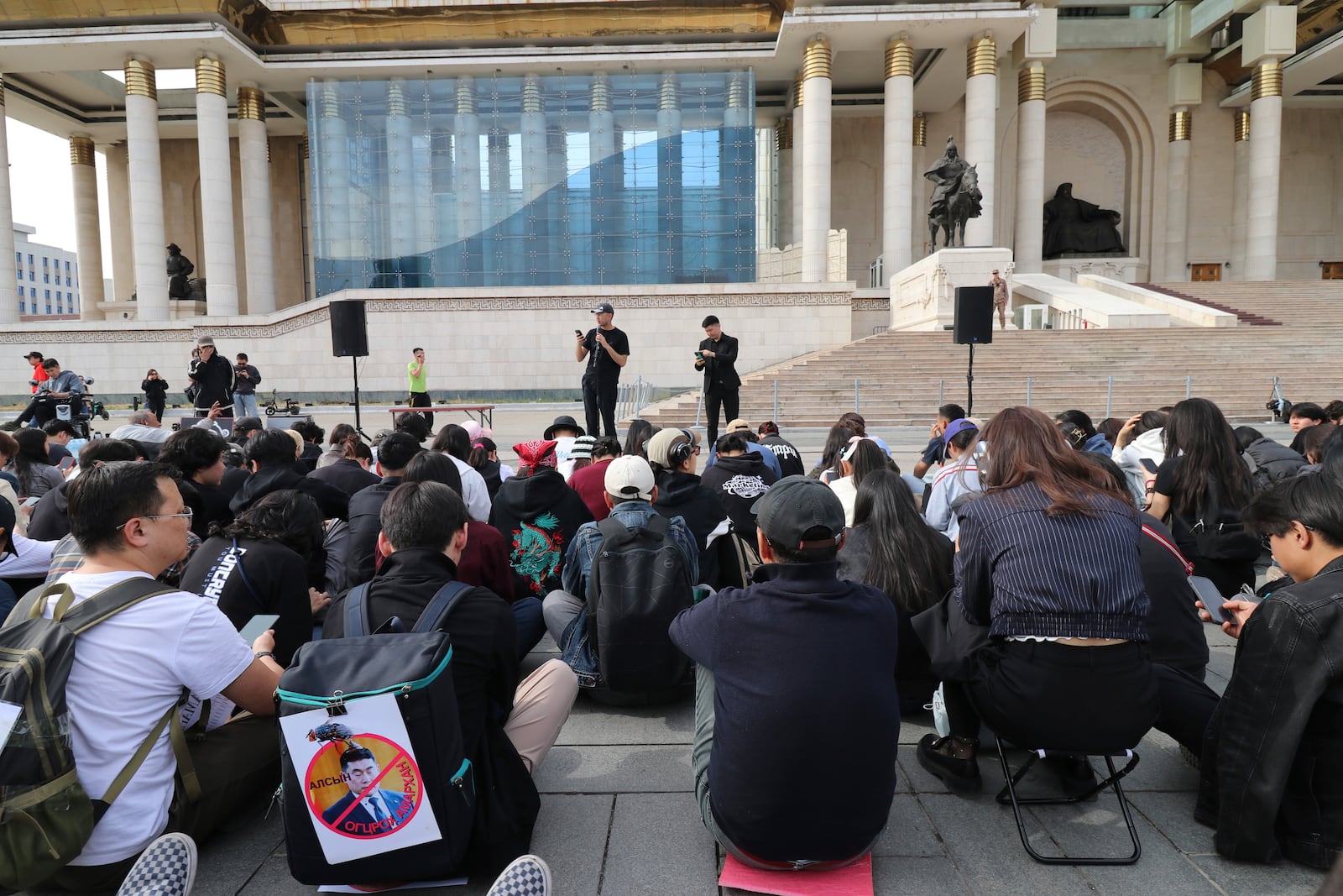 Protestors gather at a rally calling for the Prime Minister's resignation at the Sukhbaatar Square in Ulaanbaatar, Mongolia, Thursday, May 22, 2025. (AP Photo/Ganbat Namjilsangarav)