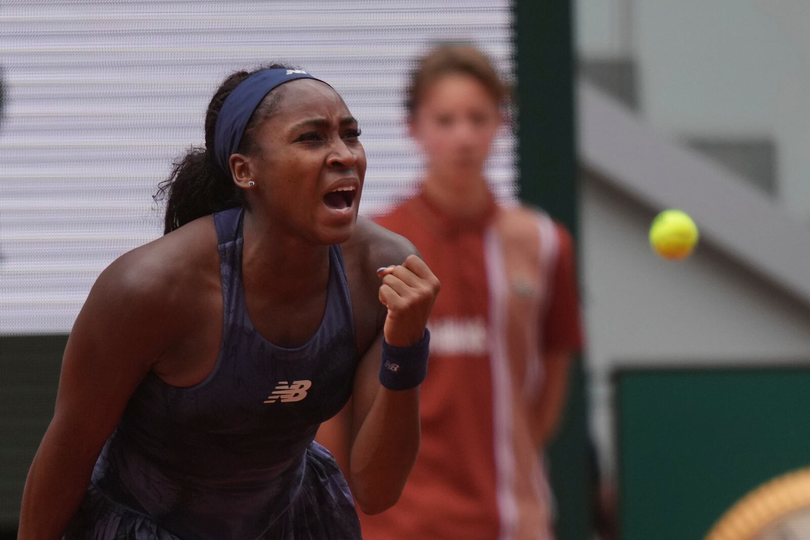 Coco Gauff of the U.S. celebrates as she won the fourth round match of the French Tennis Open against Russia's Ekaterina Alexandrova at the Roland-Garros stadium in Paris, Monday, June 2, 2025. (AP Photo/Thibault Camus)