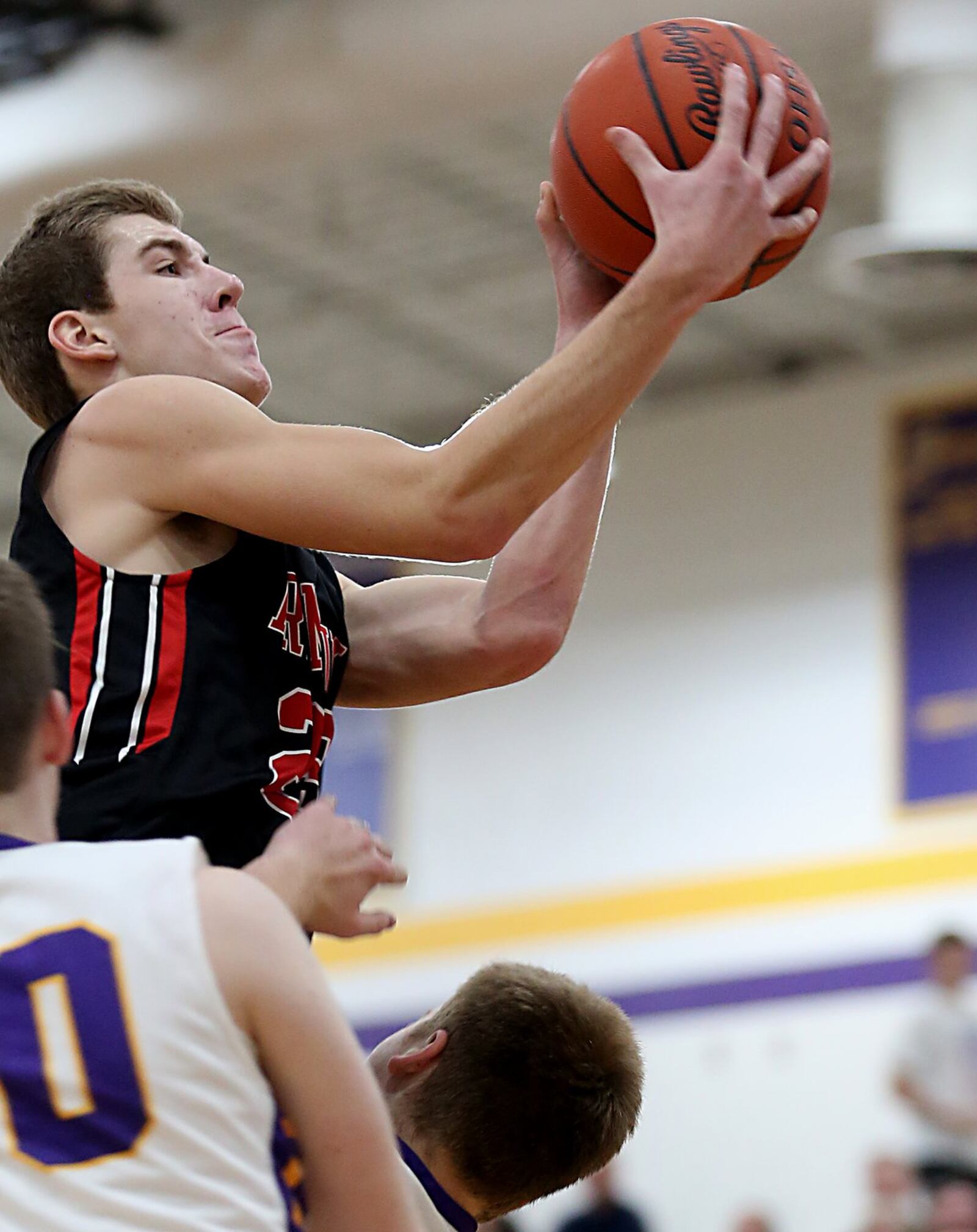 Franklin guard Jared Kinzer drives to the basket, but is called for a charge during Friday night’s game at Bellbrook. CONTRIBUTED PHOTO BY E.L. HUBBARD