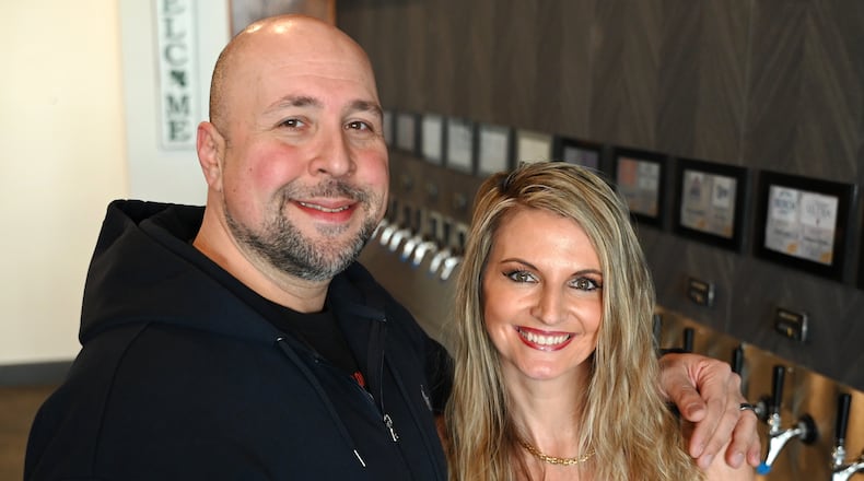 Rafael and Toni Salem own the Pour House in downtown Hamilton. They are reopening after a remodel this Friday, March 14, 2025, in time for the St. Patrick's Day weekend, one of the biggest holidays of the year for the bar and restaurant industry. MICHAEL D. PITMAN/STAFF