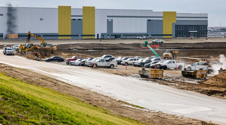 Construction continues Friday, April 1, 2022 for new buildings at Fairfield Commerce Park off of Seward Road in Fairfield. NICK GRAHAM/STAFF