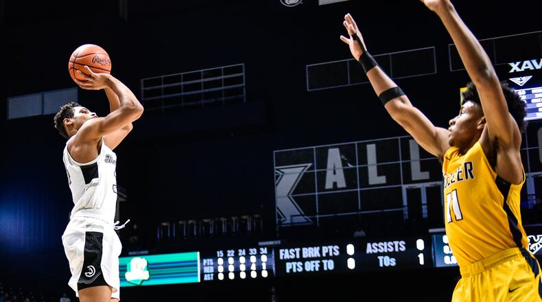 Lakota East’s Nate Johnson puts up a shot during their 47-33 loss to Moeller 47-33 in their Division I regional boys basketball semifinal Wednesday, March 13, 2019 at Xavier University’s Cintas Center in Cincinnati. Johnson scored 15 points and pulled nine rebounds in Friday’s win over Lakota West. NICK GRAHAM/STAFF