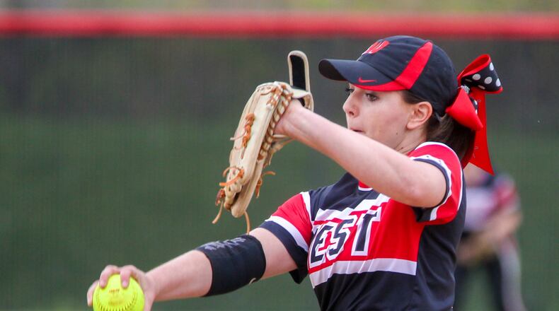 Lakota West pitcher Megan Brankamp (13) deals to the plate during a game against visiting Lakota East on April 11. GREG LYNCH/STAFF