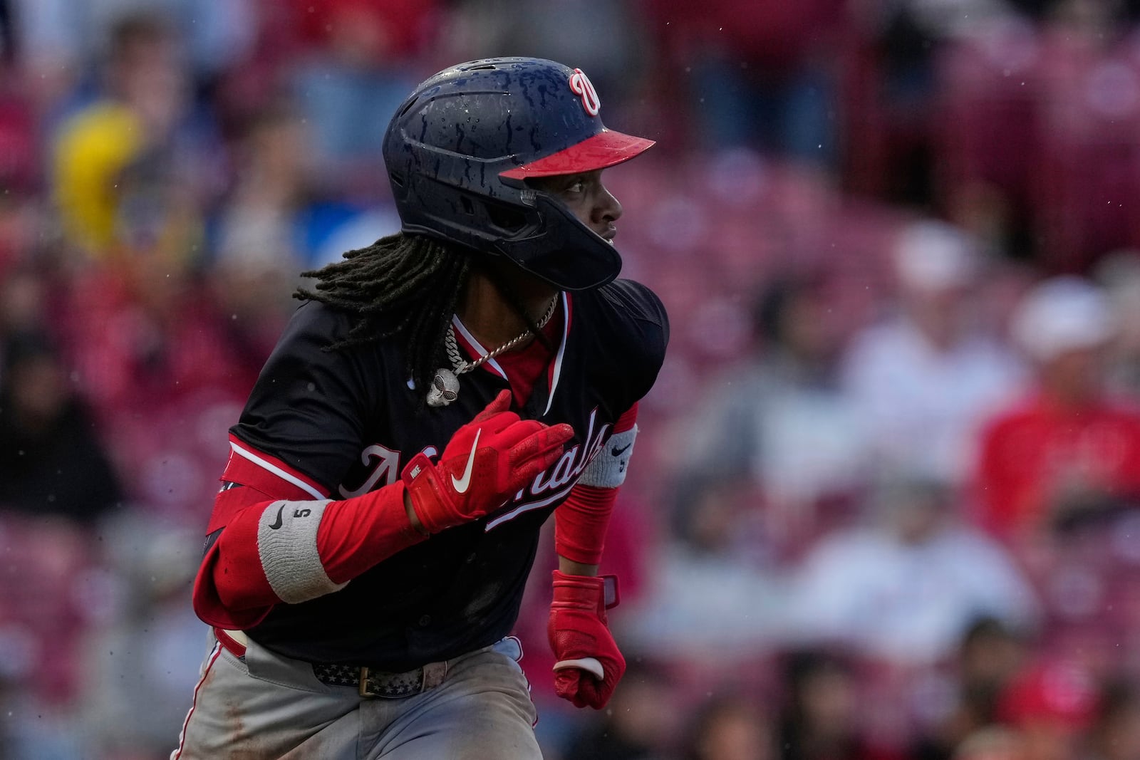 Washington Nationals' CJ Abrams watches his two-RBI double during the seventh inning of a baseball game against the Cincinnati Reds, Sunday, May 4, 2025, in Cincinnati. (AP Photo/Carolyn Kaster)