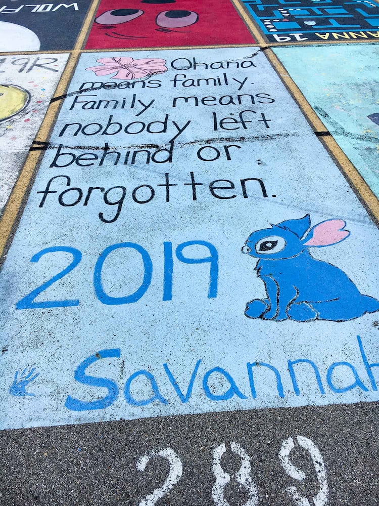 PHOTOS Lakota East seniors paint parking spots