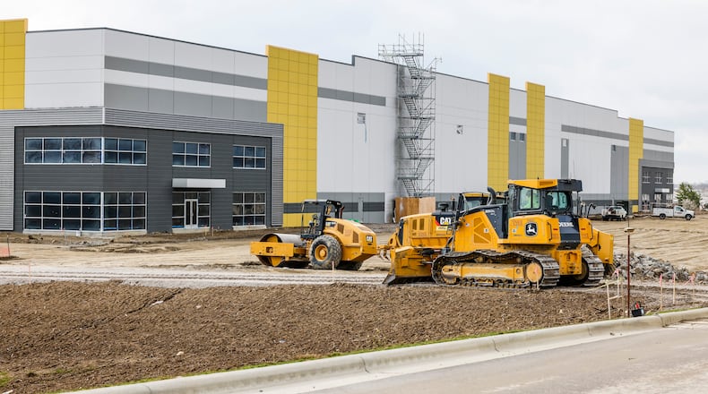 Construction continues Friday, April 1, 2022 for new buildings at Fairfield Commerce Park off of Seward Road in Fairfield. NICK GRAHAM/STAFF
