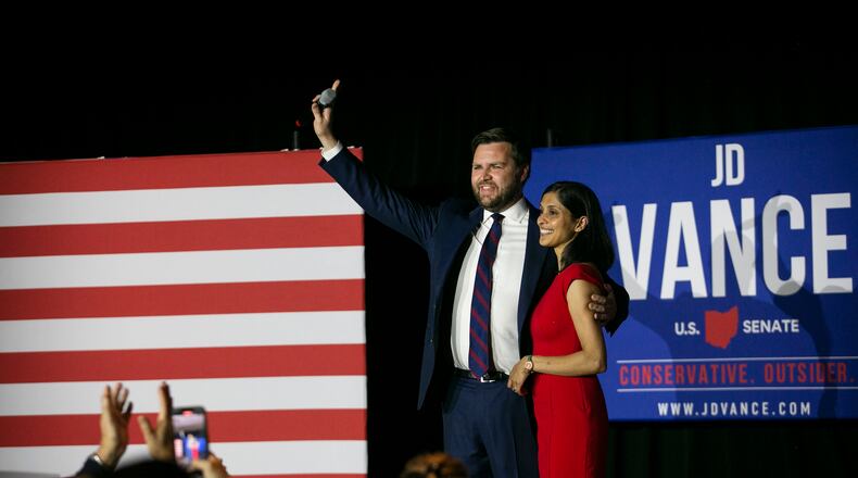 FILE —  J.D. Vance and his wife, Usha, after winning the Republican Ohio Senate primary, in Cincinnati, Ohio, on May 3, 2021. Across the country, Donald Trump has endorsed more than 200 candidates, many of whom ran unopposed or faced little-known, poorly funded opponents. (Maddie McGarvey/The New York Times)