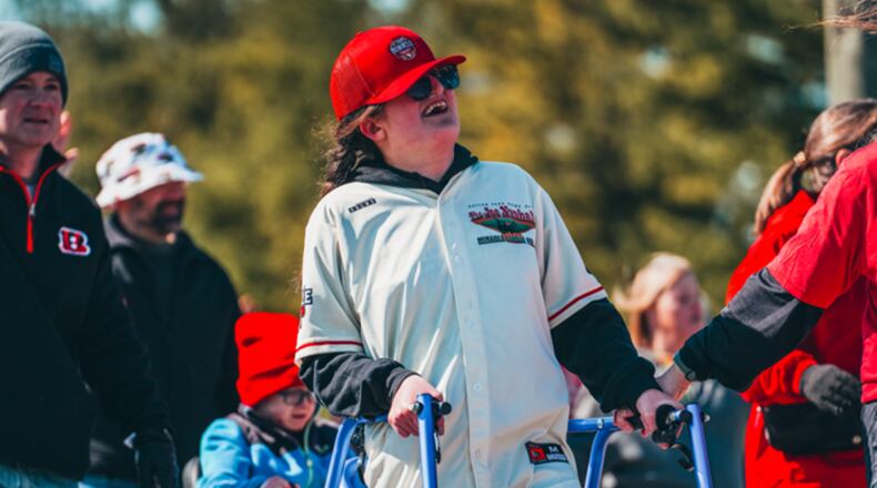 Joe Nuxhall Miracle League Field All-Star Annie Schwartz marches in the 2024 Opening Day Parade. SUBMITTED PHOTO