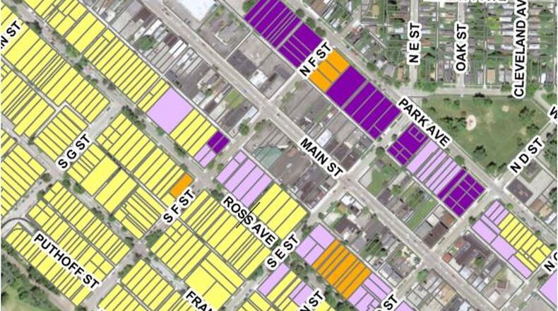 Here is a city map showing how the four new “Traditional Neighborhood” zoning designations, each in a different color, will be interspersed among each other in 643 parcels, making up about 58 acres in Hamilton’s Rossville and Prospect Hill neighborhoods. PROVIDED