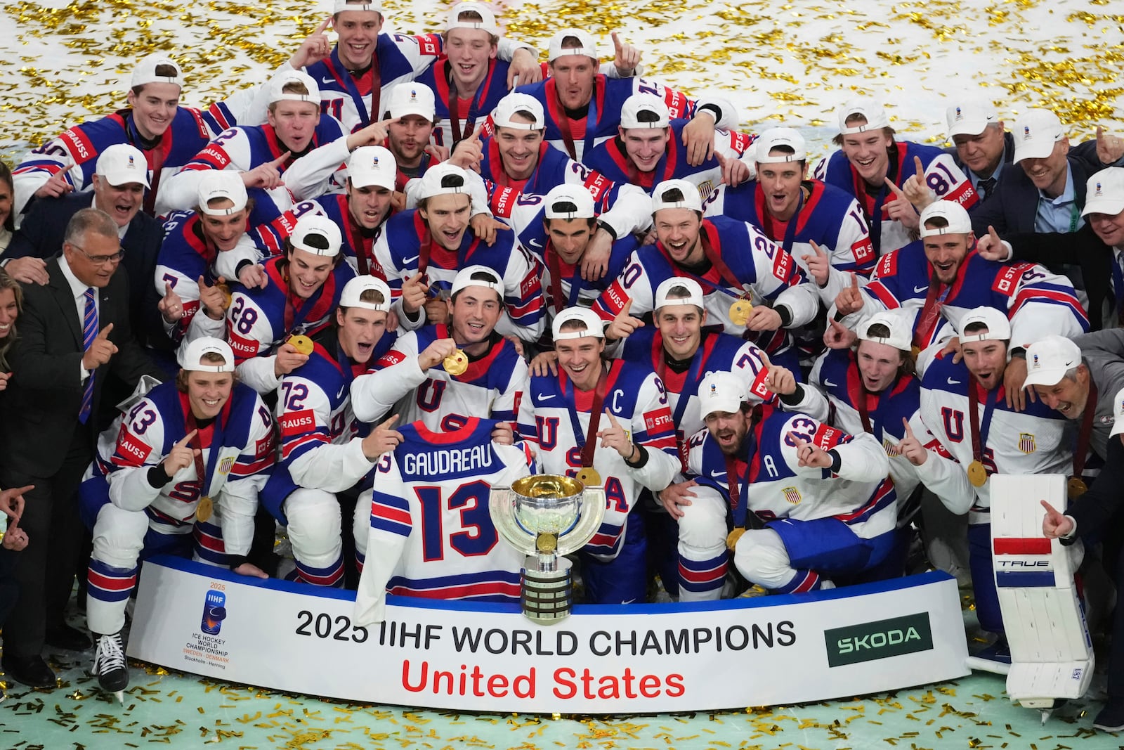 Team USA poses after winning the final match between United States and Switzerland at the ice hockey world championships in Stockholm, Sweden, Sunday, May 25, 2025. (AP Photo/Petr David Josek)