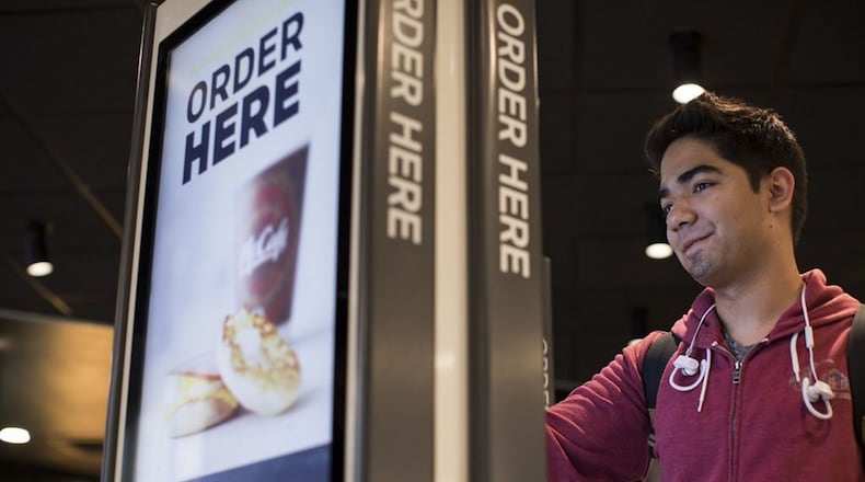 The new “Experience of the Future” conveniences at McDonald’s feature self-order kiosks in the dining room, digital menu boards in the drive-thru and Mobile Order & Pay with curbside service option using the McDonald s mobile app. CONTRIBUTED