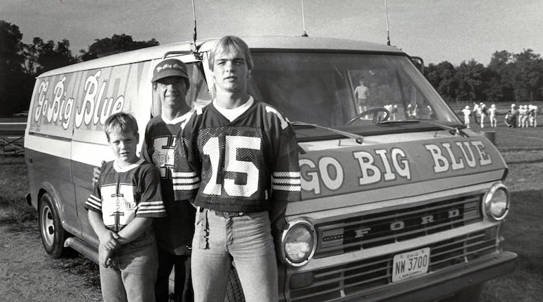 The Big Blue van with dad Bill Lobitz and sons Bill, 10, and Dan, 17, at a football game in this undated photo.