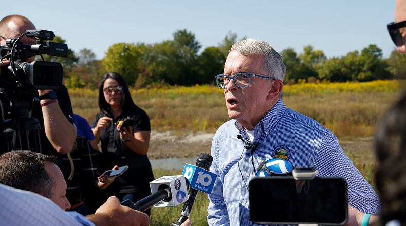 Governor Mike DeWine speaks with members of local, state and national media about Springfield and how Donald Trump mentioned the city during the debate Wednesday, Sept. 11, 2024 during a tour of the H2Ohio Rainbow Run Wetland located on Old Clifton Road in Clark County. BILL LACKEY/STAFF