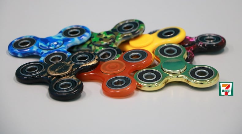 Flying off the shelves, 7-Eleven stores sell Fidget Spinners, the popular new toy designed to calm nerves, ease anxiety and provide hours of entertainment. (PRNewsfoto/7-Eleven, Inc.)