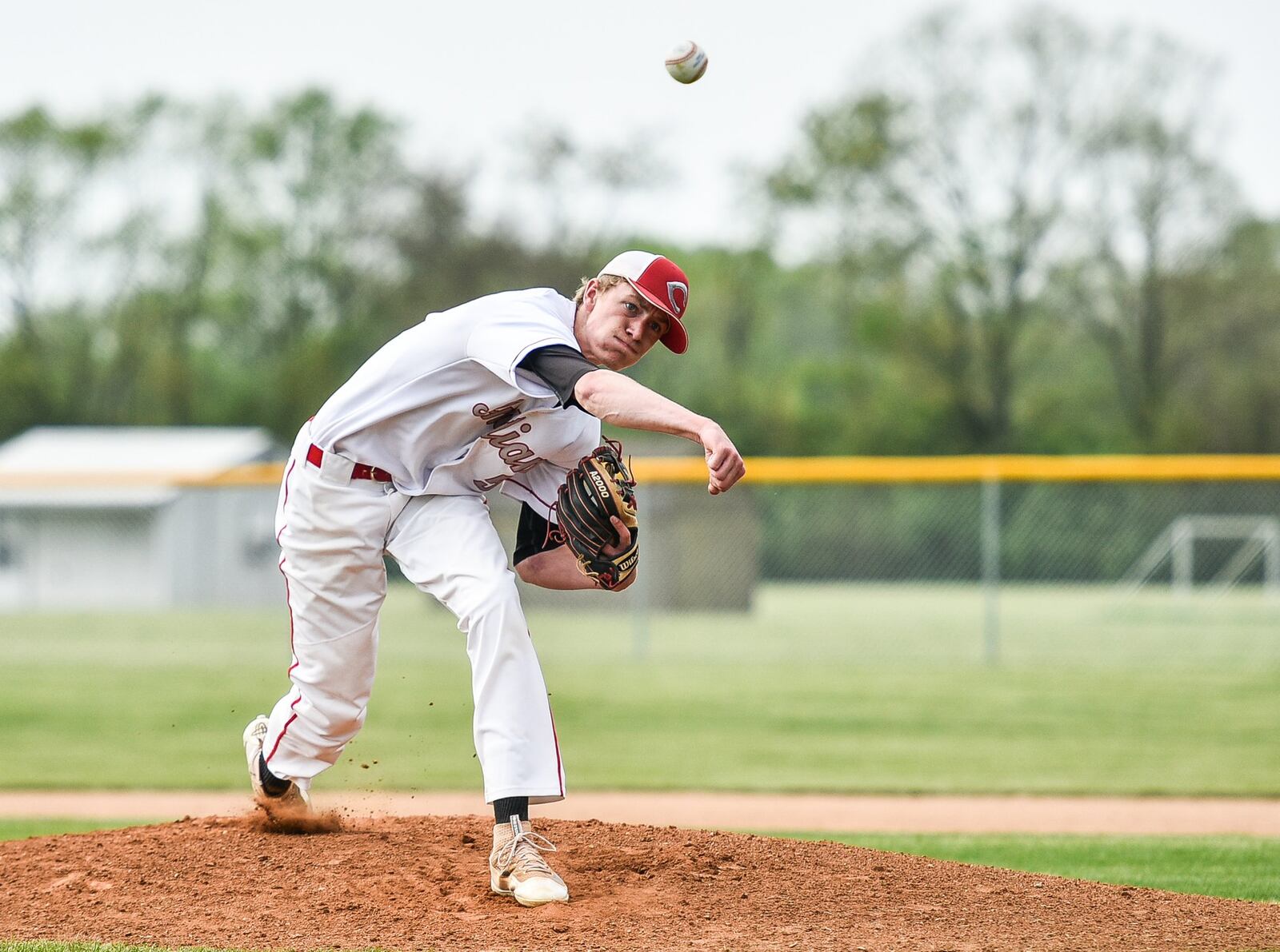 Carlisle’s Brandon Saylor throws a pitch during a Division II sectional game against Preble Shawnee on May 9 at Sam Franks Field in Carlisle. NICK GRAHAM/STAFF