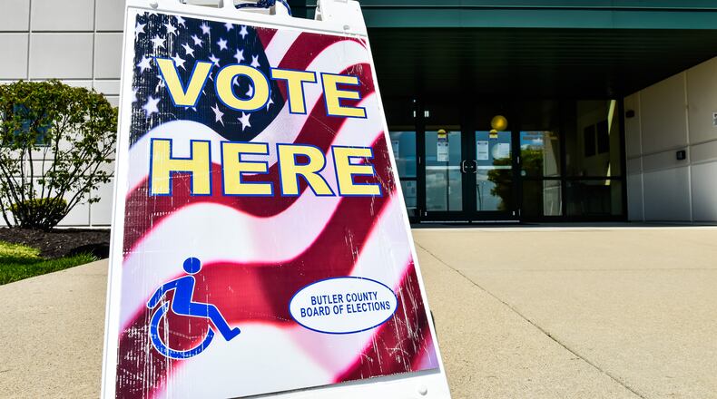 Voters came out to turn in their ballots at the Butler County Board of Elections on Princeton Road in Hamilton on election day Tuesday, April 28 after it had been postponed due to coronavirus pandemic. NICK GRAHAM / STAFF