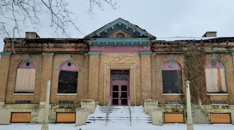 Dan Mayzum, owner of the former Carnegie Library in Middletown, has started a capital campaign in hopes of generating between $250,000 to $1 million to offset the estimated $4.3 million renovation. NICK GRAHAM/STAFF