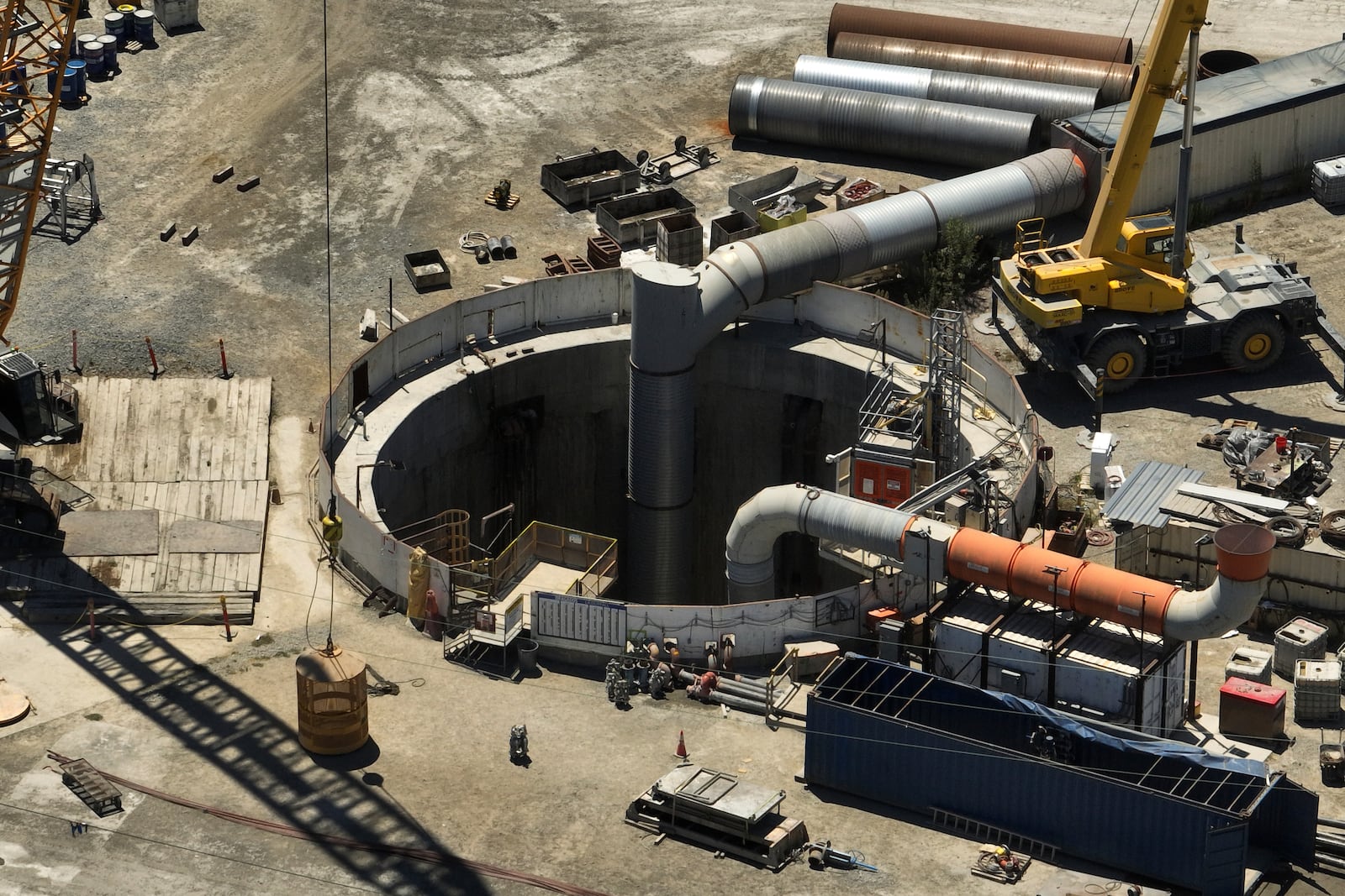 An aerial view shows the only entrance to an industrial tunnel in the Wilmington neighborhood of Los Angeles, Thursday, July 10, 2025, after a section of the tunnel partially collapsed Wednesday night. (AP Photo/Jae C. Hong)