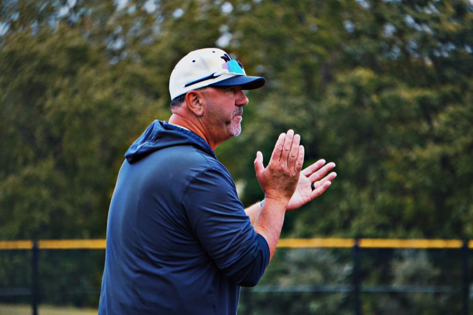 Monroe coach Ed Beck reacts during his Hornets' Division III tournament game against Talawanda on Wednesday. CHRIS VOGT / CONTRIBUTED