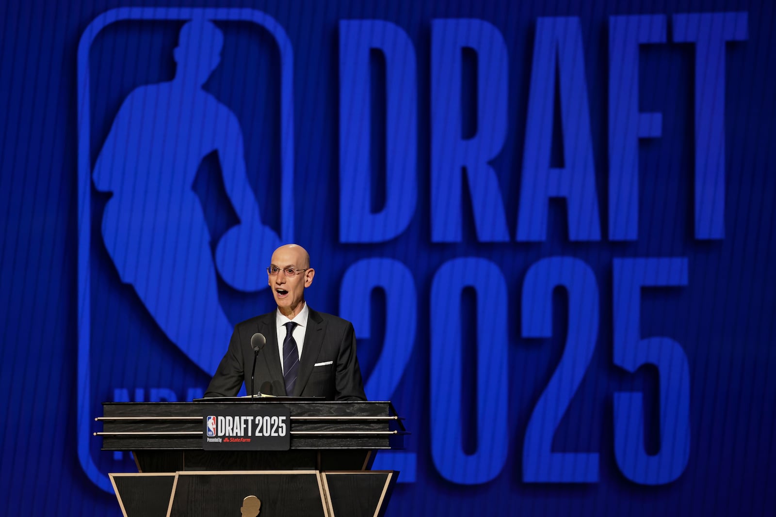 NBA commissioner Adam Silver announces the start of the first round of the NBA basketball draft, Wednesday, June 25, 2025, in New York. (AP Photo/Adam Hunger)