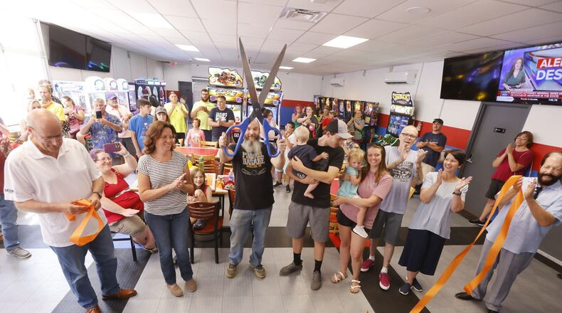 Pinball Garage held a grand opening of its expansion, along with a huge party. They've doubled their size and added 30 more games and a dining area. NICK GRAHAM/STAFF