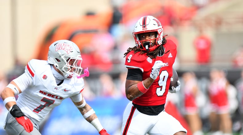 Miami running back Kenny Tracy runs for a first down against UNLV on Saturday at Yager Stadium. KYLE HENDRIX / CONTRIBUTED