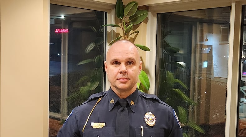 Sgt. Eddie Myers from the Monroe Police Department was presented the Distinguished Service Medal with Valor Tuesday night for his efforts trying to save a woman's life after she drove into a retention pond off I-75 on Oct. 29, 2023. SUBMITTED PHOTO