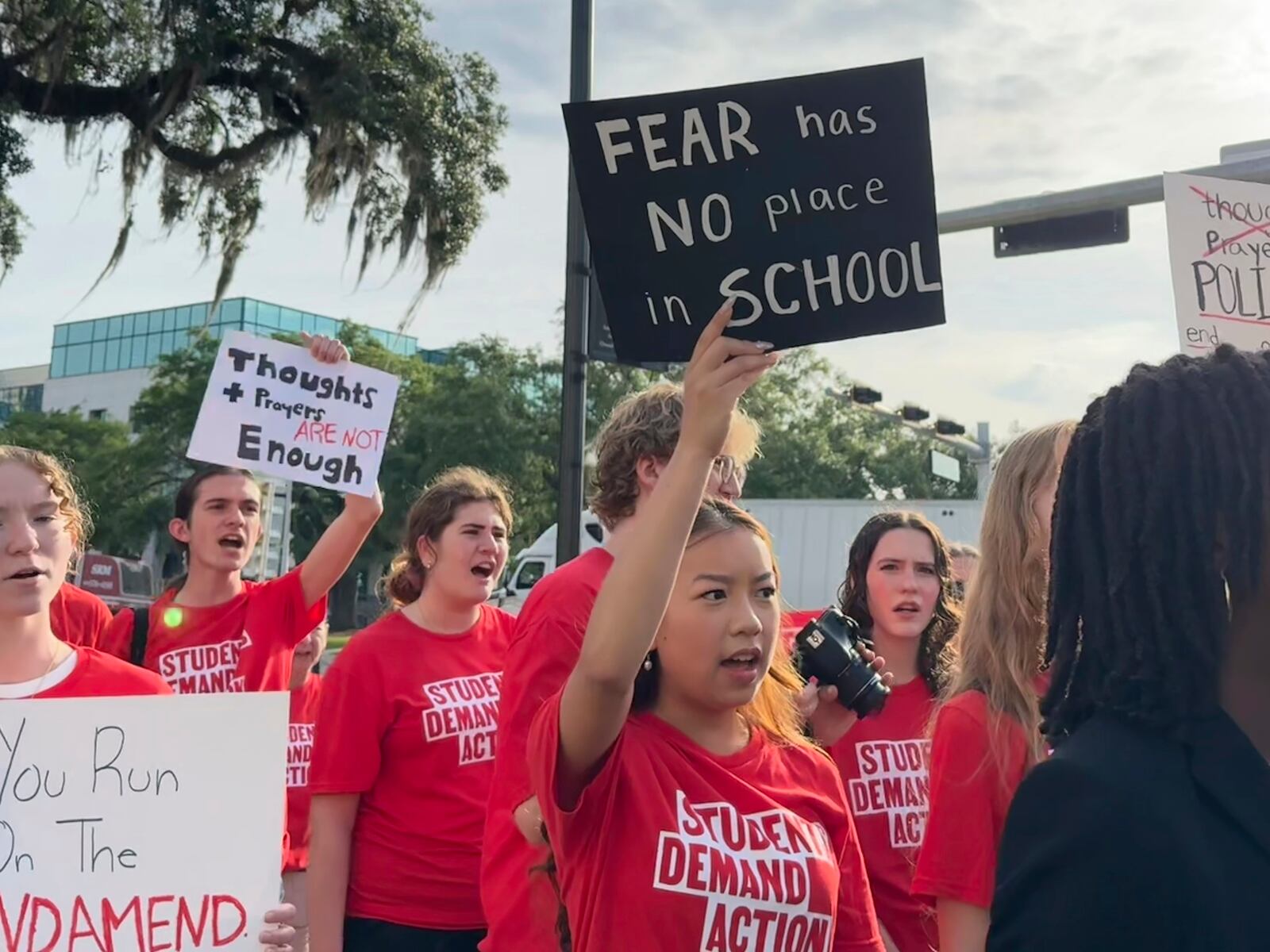 Students and activists rally for gun control policies outside of Florida's historic old capitol, Wednesday, April 23, 2025 in Tallahassee, Fla., less than a week after a deadly shooting at Florida State University. (AP Photo/Kate Payne)