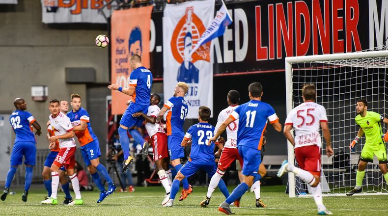 FC Cincinnati’s Harrison Delbridge jumps up for a header during their 2017 Lamar Hunt U.S. Open Cup semifinal game against New York Red Bulls Tuesday, Aug. 15 at Nippert Stadium on the University of Cincinnati Campus in Cincinnati. NICK GRAHAM/STAFF