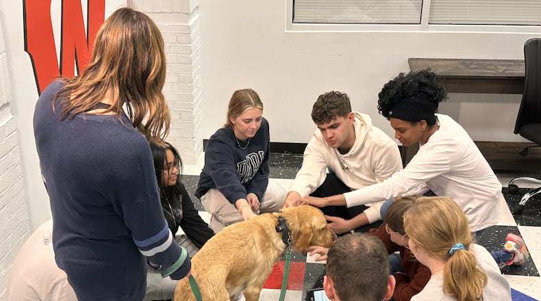 Students at Lakota West High School have a new, four-legged classmate whose field of study and project work is to ease their stress. And the school’s new therapy dog – Downy – is funded in part by a family struck by a local tragedy in 2024. (Provided)