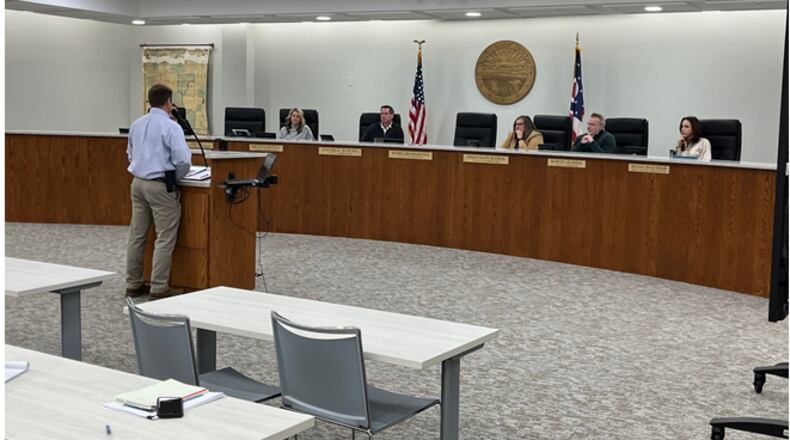 Tyler Holden of Blue Rock Properties makes his case for a rezoning request for 30 acres in Union Twp. before the Warren County Commission on Tuesday, Jan. 30, 2024. After a two-hour hearing, Holden opted to withdraw his request. More than 40 residents who opposed the request attended the meeting, but did not speak after Holden withdrew his request. ED RICHTER/STAFF
