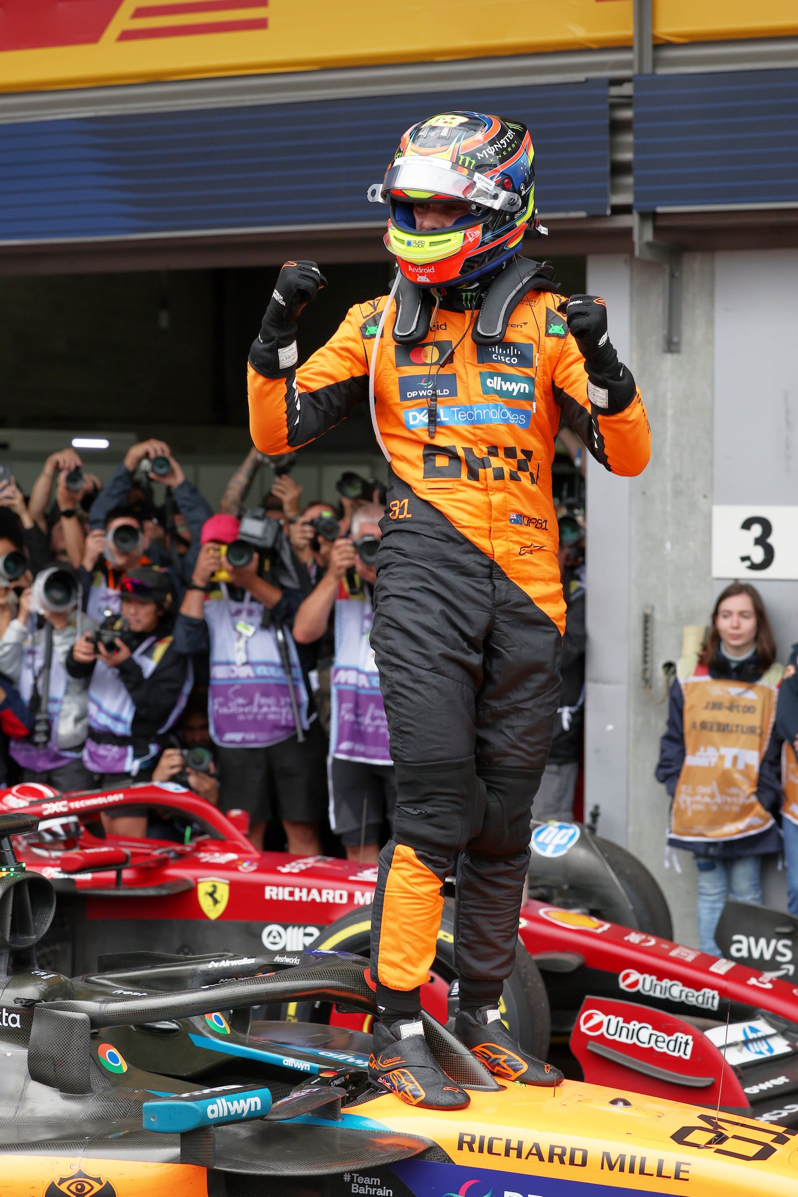 McLaren driver Oscar Piastri of Australia celebrates after winning the Formula One Grand Prix at the Spa-Francorchamps racetrack in Spa, Belgium, Sunday, July 27, 2025. (Yves Herman, Pool Photo via AP)