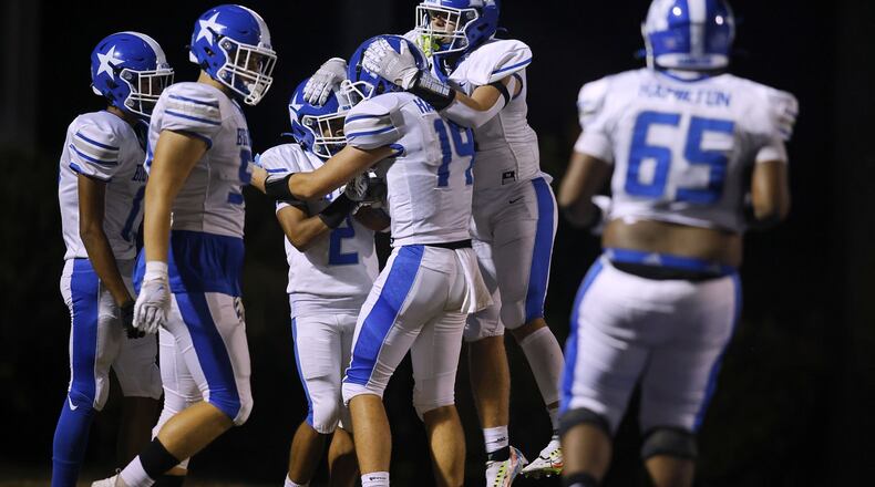 Hamilton’s Semaj Aldridge celebrates his touchdown with teammates during their football game against Middletown Friday, Sept. 2, 2022 at Barnitz Stadium in Middletown. Hamilton won 17-0. NICK GRAHAM/STAFF