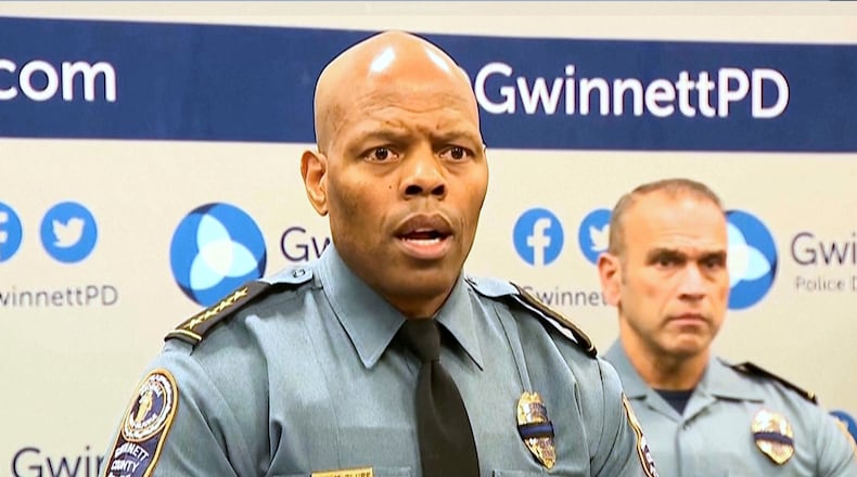 An image taken from WSB video shows Gwinnett County Police Chief J.D. McClure speaks at a news conference Sunday, Feb. 1, 2026, in Gwinnett County, Ga., following the shootings of two officers at a hotel. (WSB via AP)