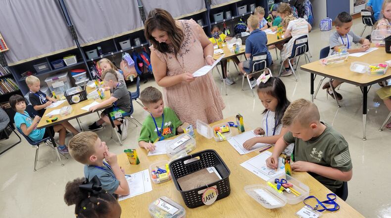A teacher works with students at Clearcreek Elementary in Springboro City School District during the district's first day in August 2022. Photo courtesy of Springboro Schools.