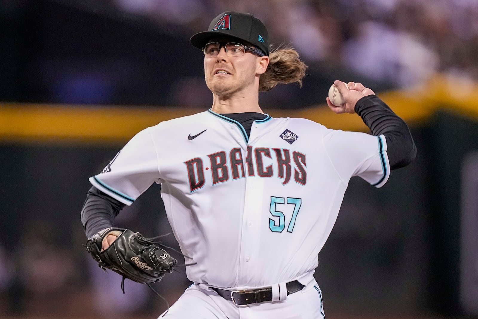 FILE - Arizona Diamondbacks relief pitcher Andrew Saalfrank throws against the Texas Rangers during the ninth inning in Game 3 of the baseball World Series Monday, Oct. 30, 2023, in Phoenix. (AP Photo/Brynn Anderson, FIle)