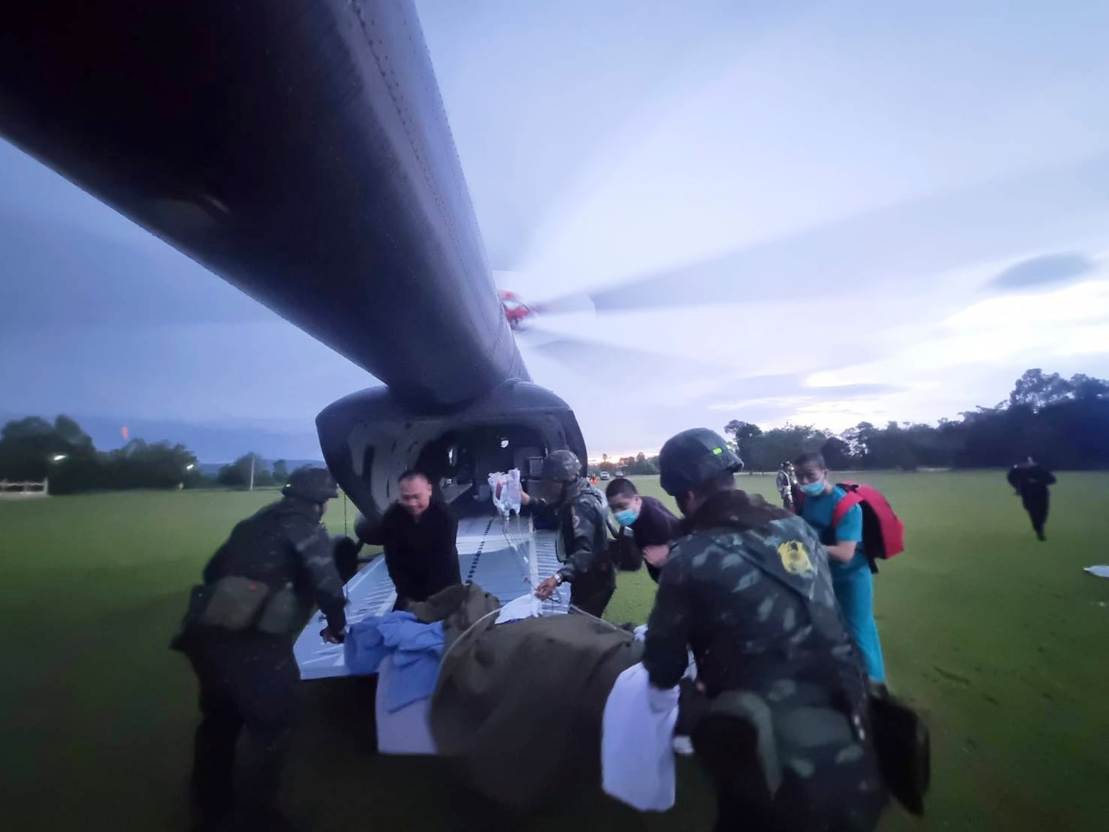 This photo released by the Royal Thai Army, shows an injured Thai soldier who stepped on a land mine being airlifted to a hospital in Ubon Ratchathani province, Thailand, Wednesday, July 23, 2025. (The Royal Thai Army via AP)