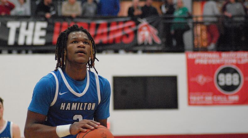 Hamilton's Andrea Holden eyes the rim during a free throw against Badin on Saturday in the Butler County Backyard Bash at Fairfield Arena. Chris Vogt/CONTRIBUTED