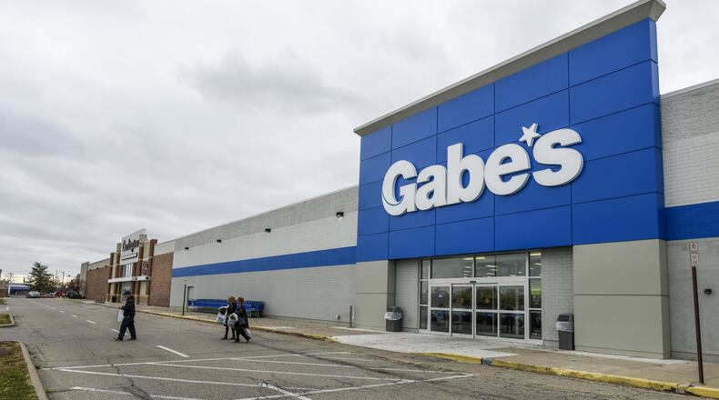 Shoppers exit Gabe’s department store, one of the tenants of the Towne Mall Galleria in Middletown. NICK GRAHAM/STAFF