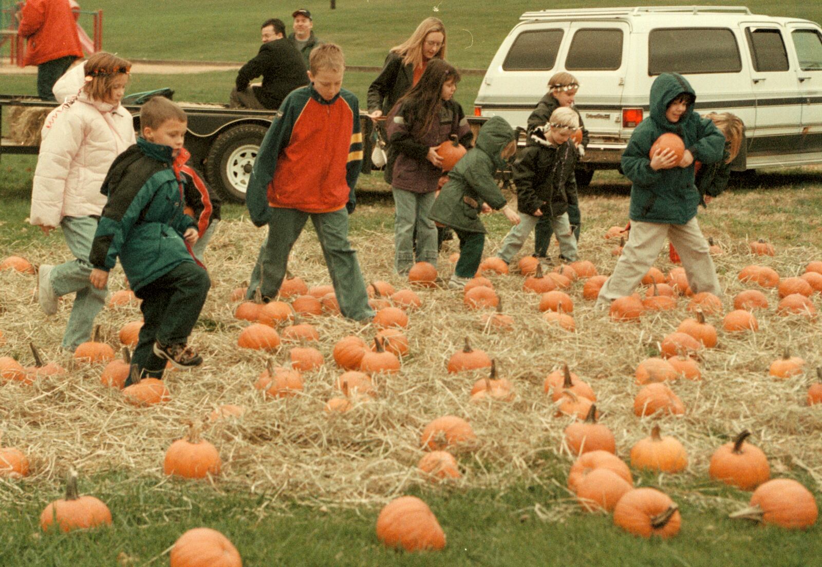 John Janco/Journal-News
Cleveland Elementary School children search for their perfect pumpkin during the school's annual Chilli Supper and Fall Fling Friday evening at the school